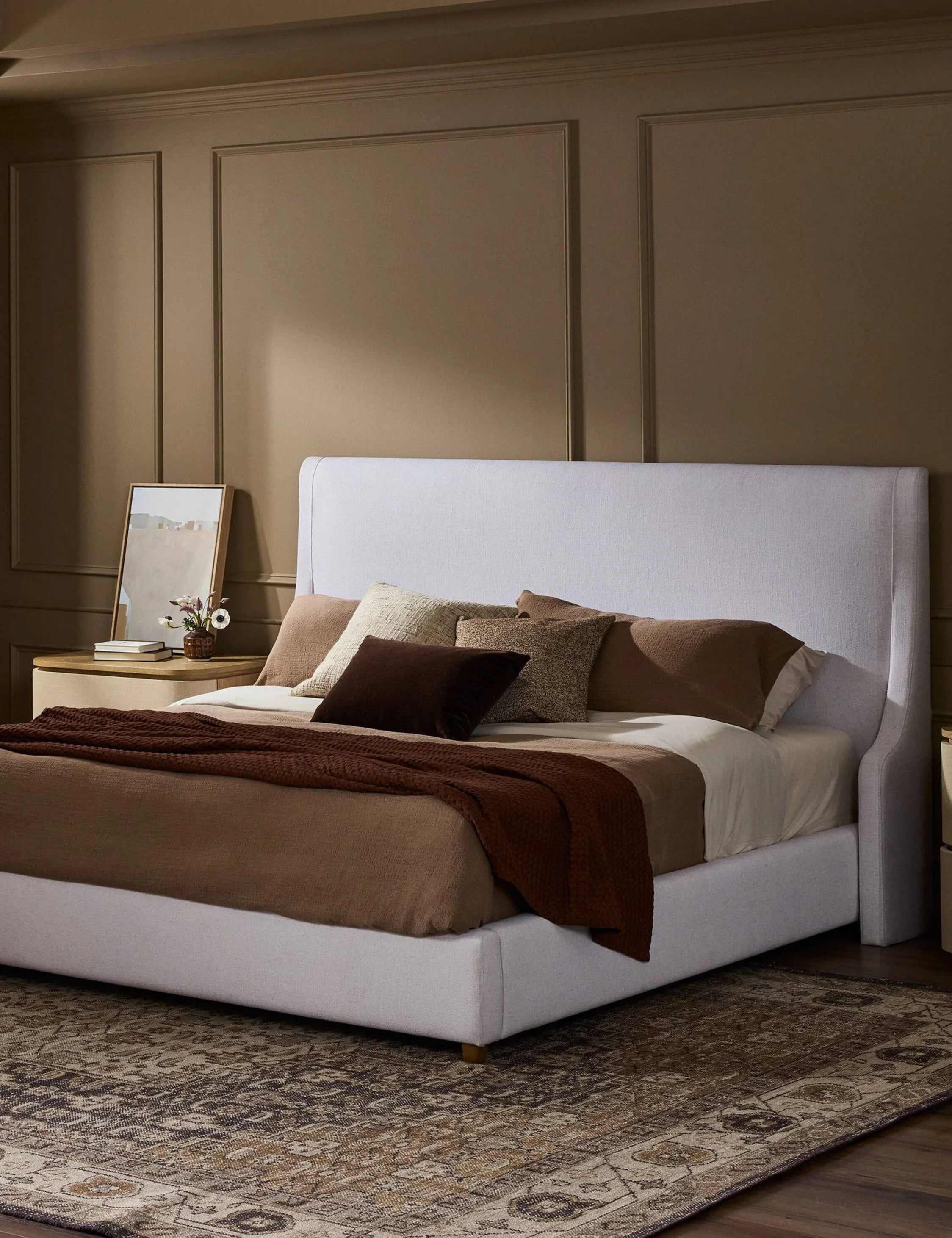 Platform Bed - Designed with a low profile and winged headboard, the bed brings a tailored look to comfort