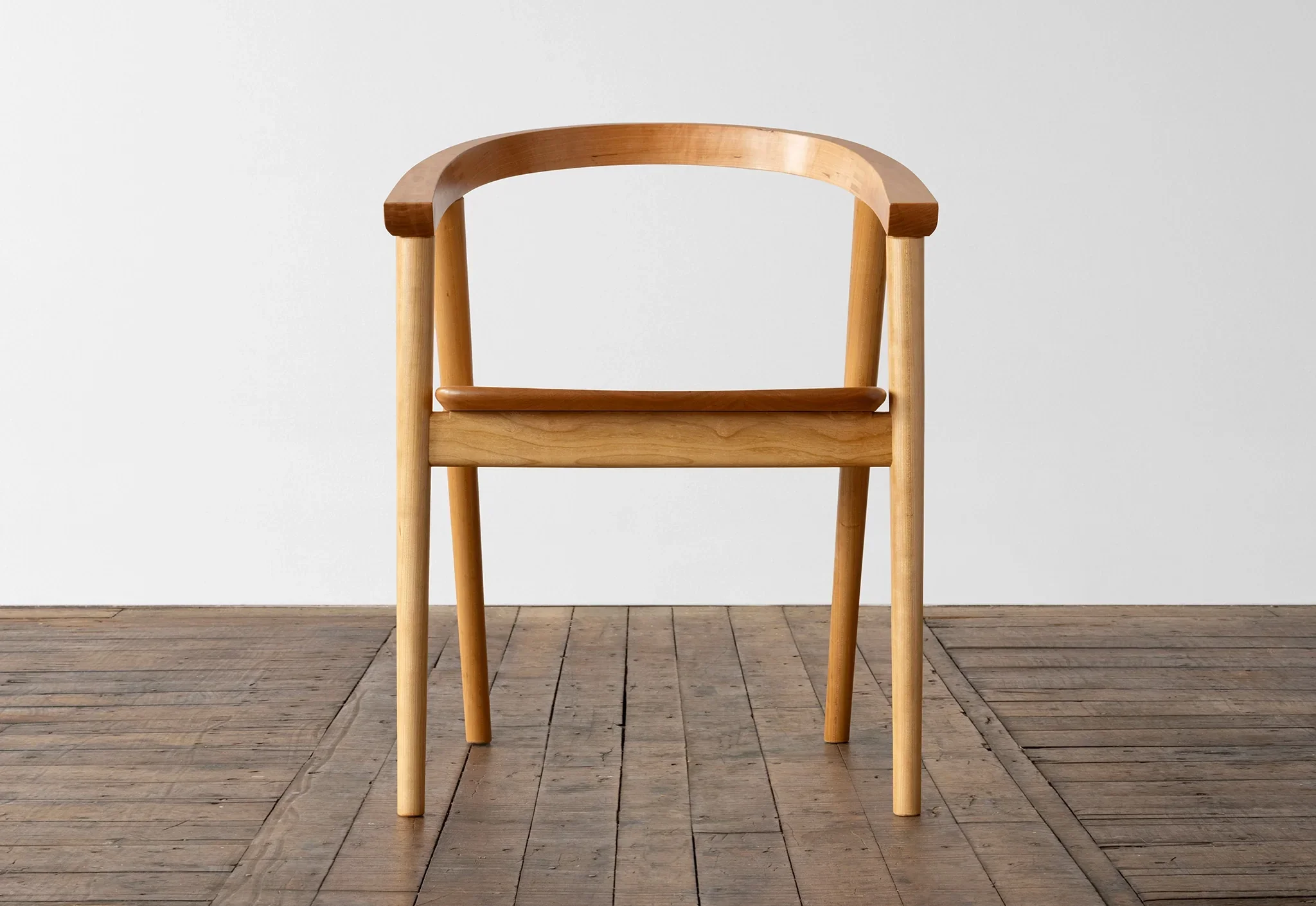 Chair - Due to the well-considered geometry of the seat and the relationship to the continuous arm and crest rail, the