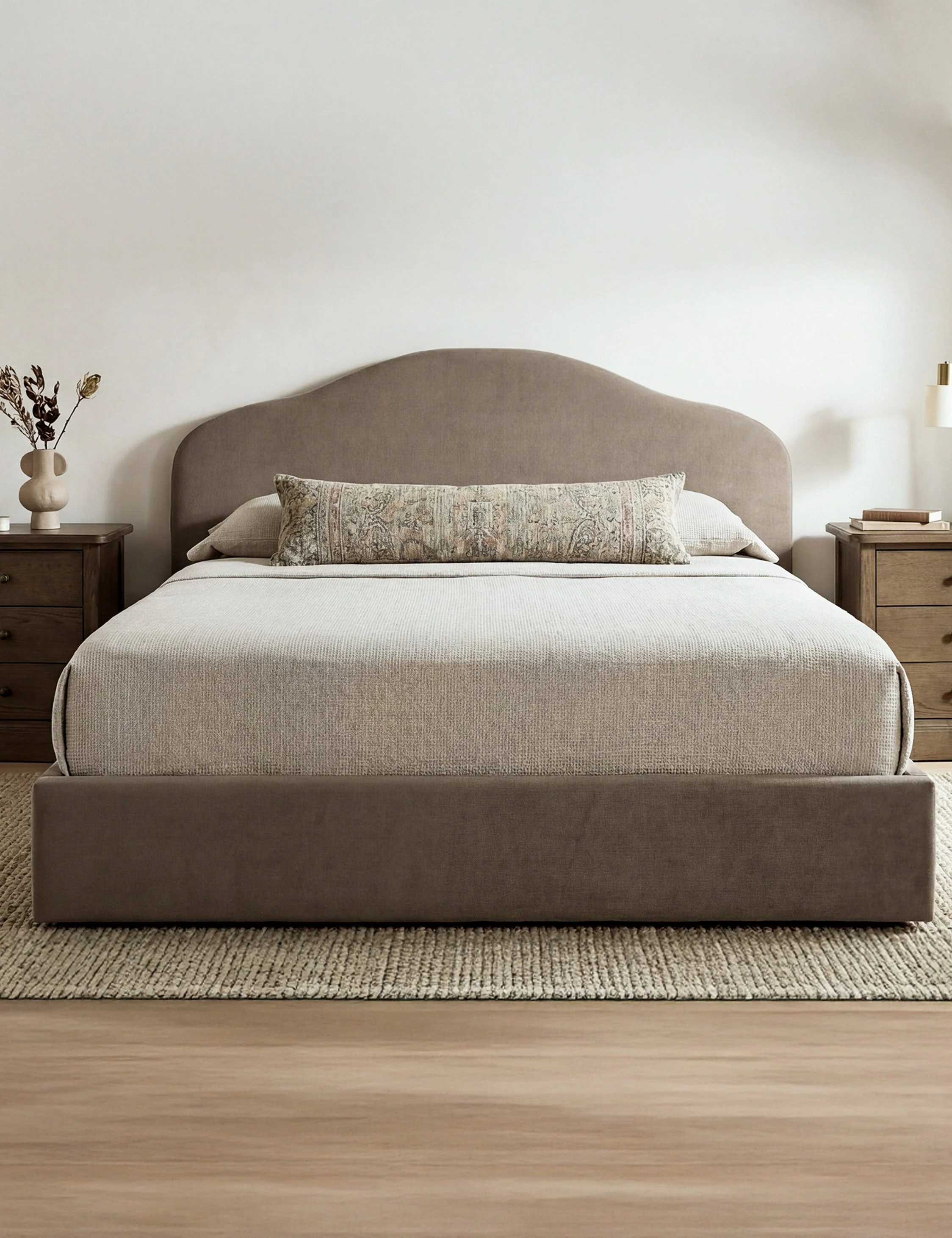 Bed - A softer take on tradition, the bed reworks a classic arched headboard with clean, tailored lines