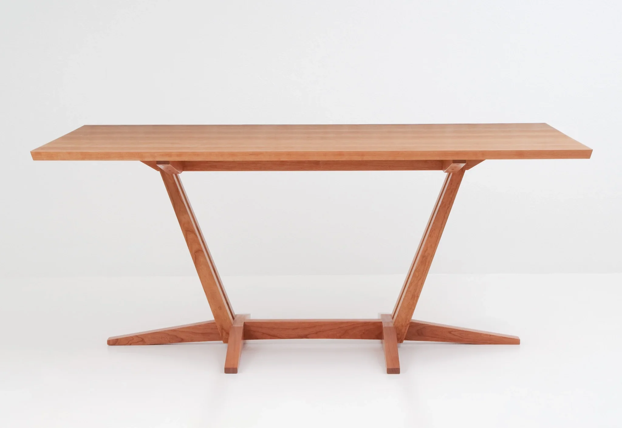 Trestle Table - Playing with opposites like light and shadow, space and substance, the brings all to rest in one