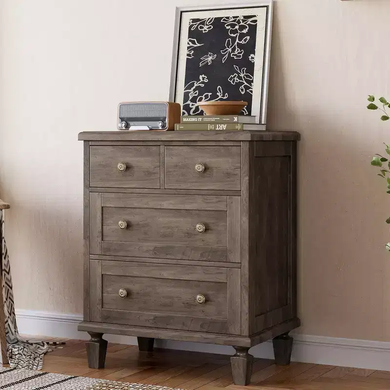 4-Drawer Dresser with Tapered Legs and Carved Handles