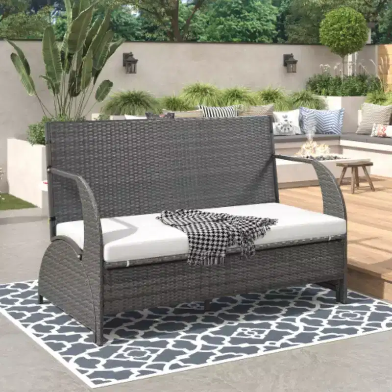 Versatile outdoor loveseat that converts to four seats and a table, suitable for gardens and lawns