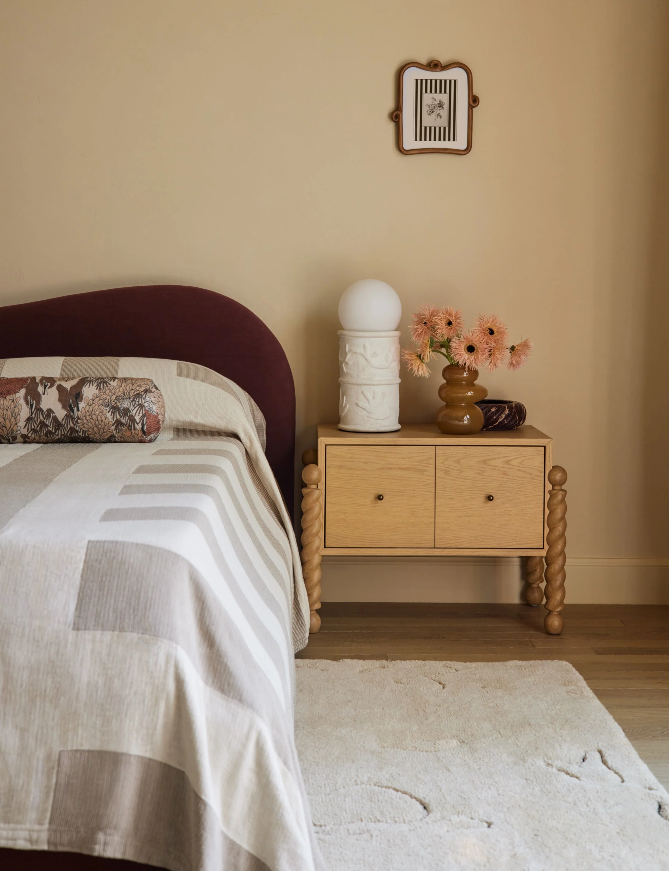 Nightstand - With a refined blend of shape and line, the nightstand showcases sculptural, turned legs that frame a clean-lined case