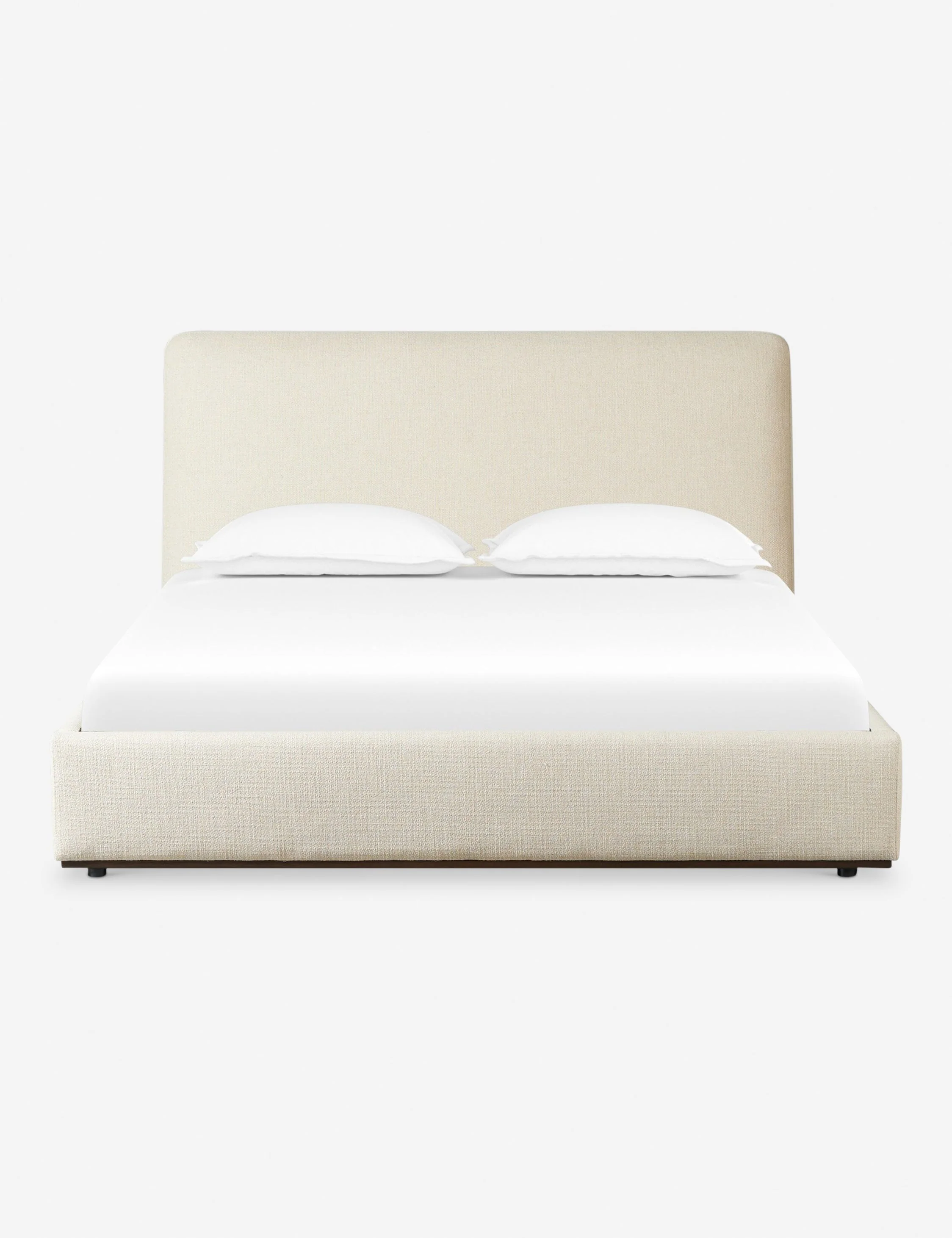 Platform Bed - With its gently curved headboard and streamlined shape, the bed offers a relaxed yet polished foundation for the bedroom