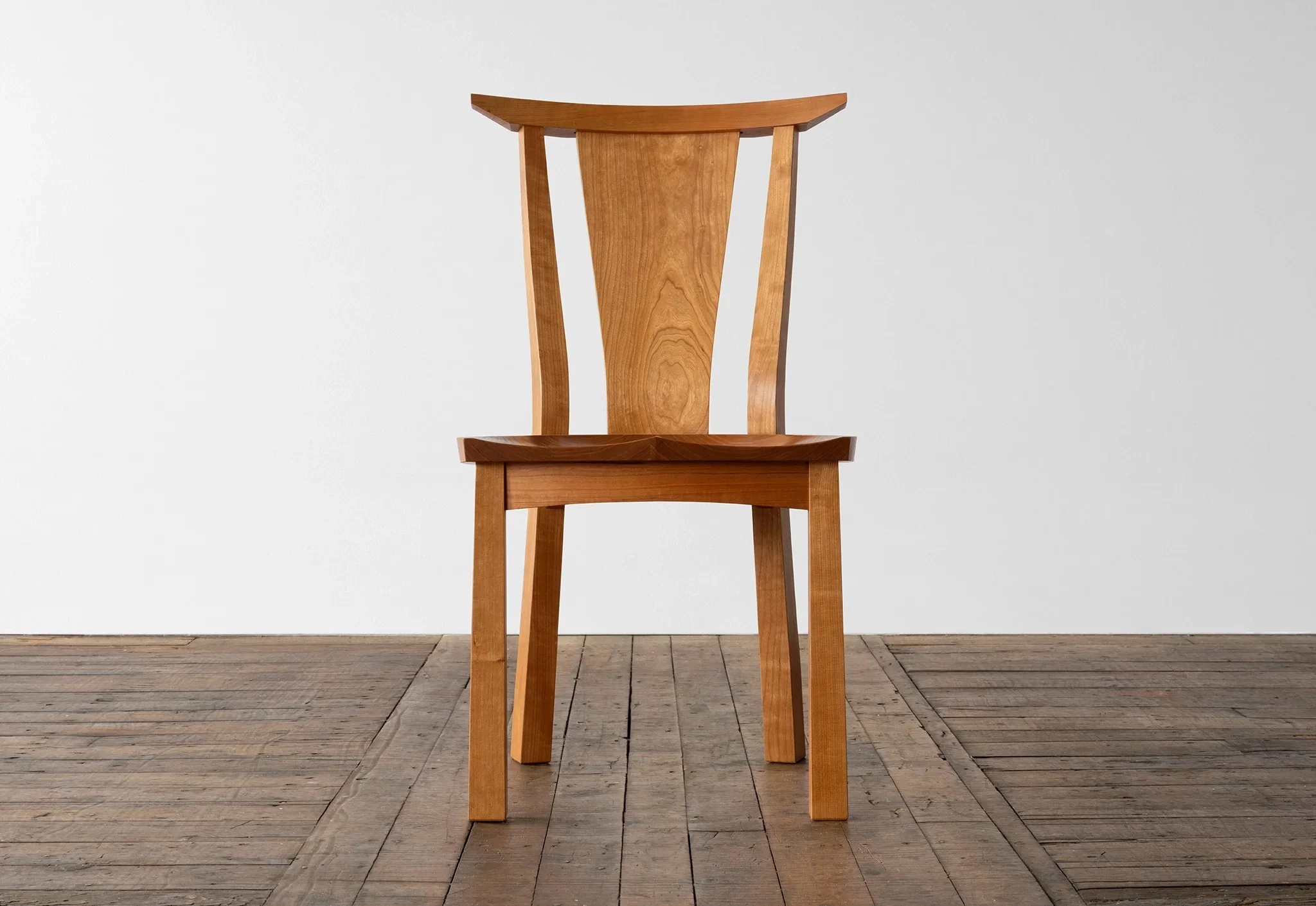 Chair - In its careful, thoughtful use of sustainably harvested hardwoods, our Chairs highlight natural ring patterns