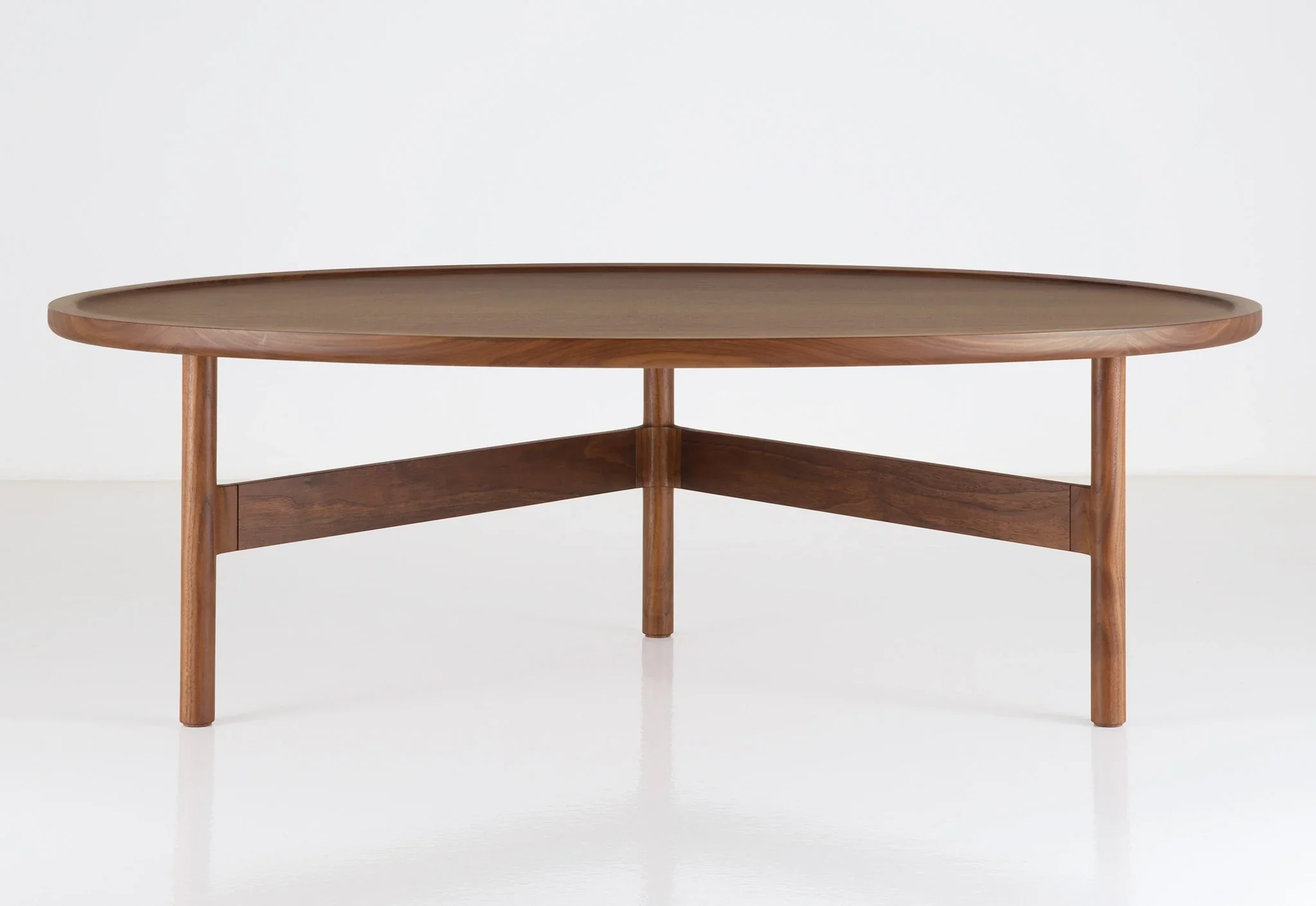 Coffee Table - The borrows its simplicity from traditional designs, and its light, contemporary profile from minimalism