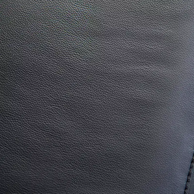 HOMES: Inside + Out Bisous Arm Chair Leatherette with Manual Side Lever Recliner