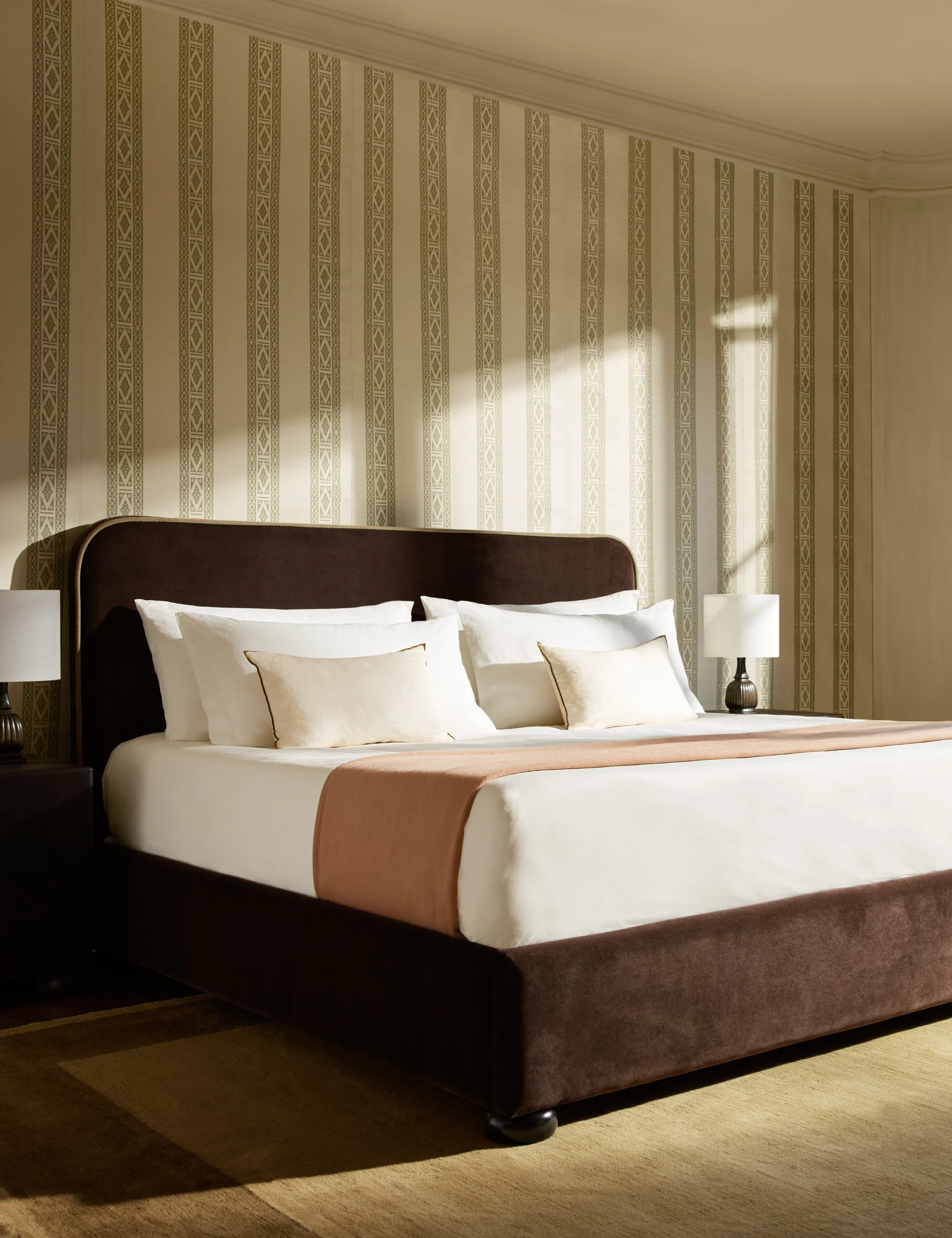 Bed The bed is set for undersd impact. Allover upholstery on the bed frame and headboard fashions a clean, luxurious look ready to style to