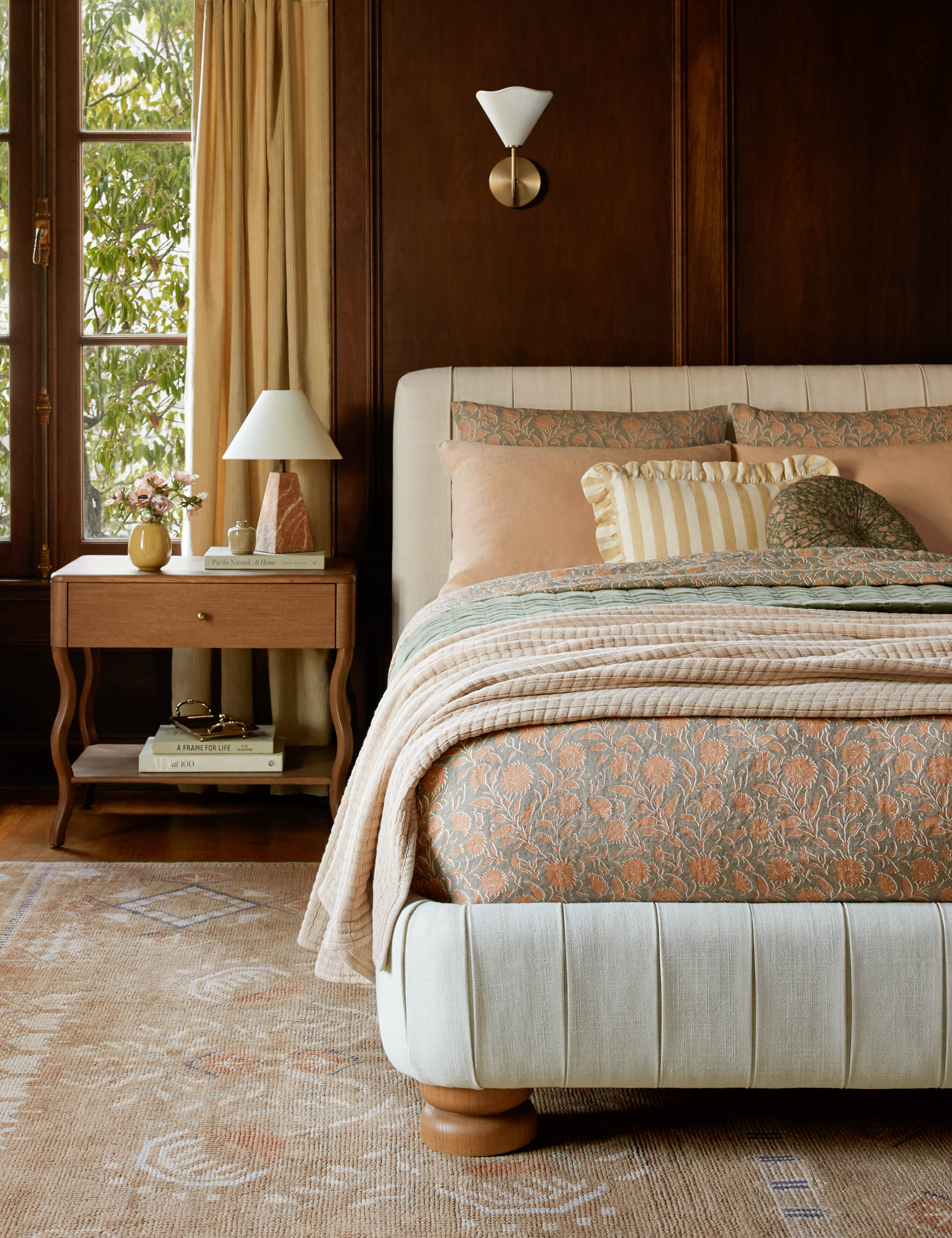 Nightstand The nightstand brings a whimsical line to spacious bedside storage. The wavy silhouette strikes a modern feel, with a brass ball drawer