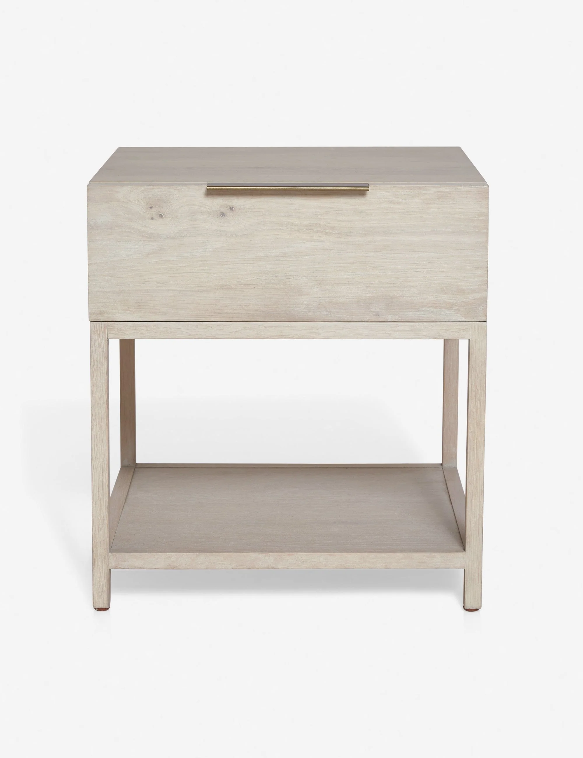 Nightstand An airy, open frame supports a spacious drawer fitted with a sk iron pull in this thoroughly refined bedside table. A solid oak grain
