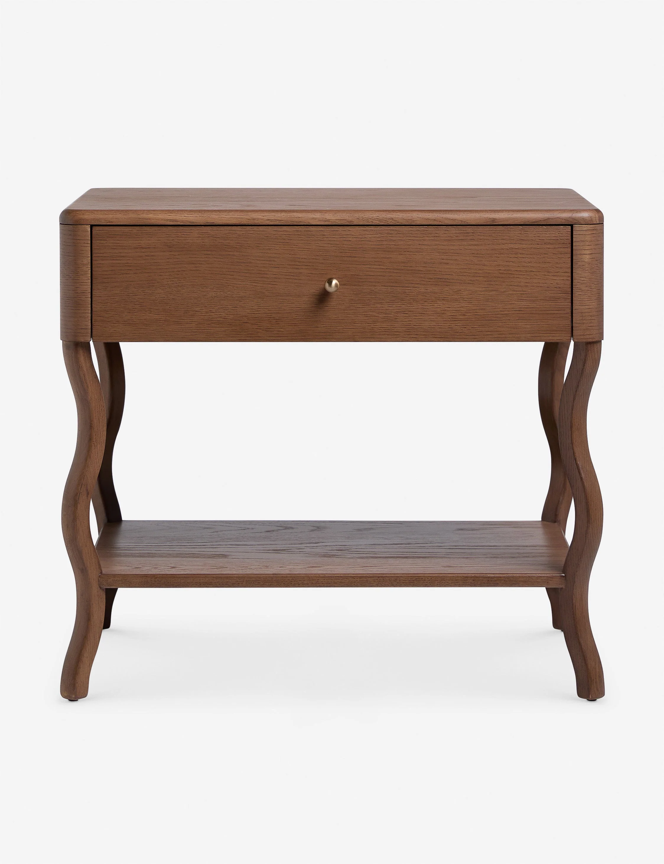 Nightstand The nightstand brings a whimsical line to spacious bedside storage. The wavy silhouette strikes a modern feel, with a brass ball drawer