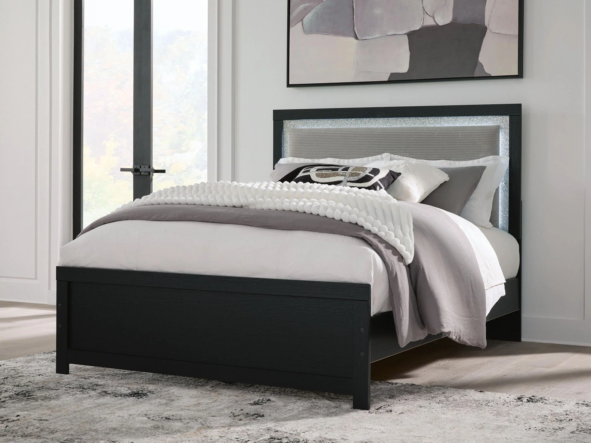 Upholstered Panel Bed — Seamlessly incorporated LED accent lighting on the headboard provides practical and stylish illumination