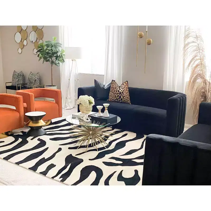 Round Stone Top Side Table with Black & Gold Hourglass Base, Modern Sculpture Accent