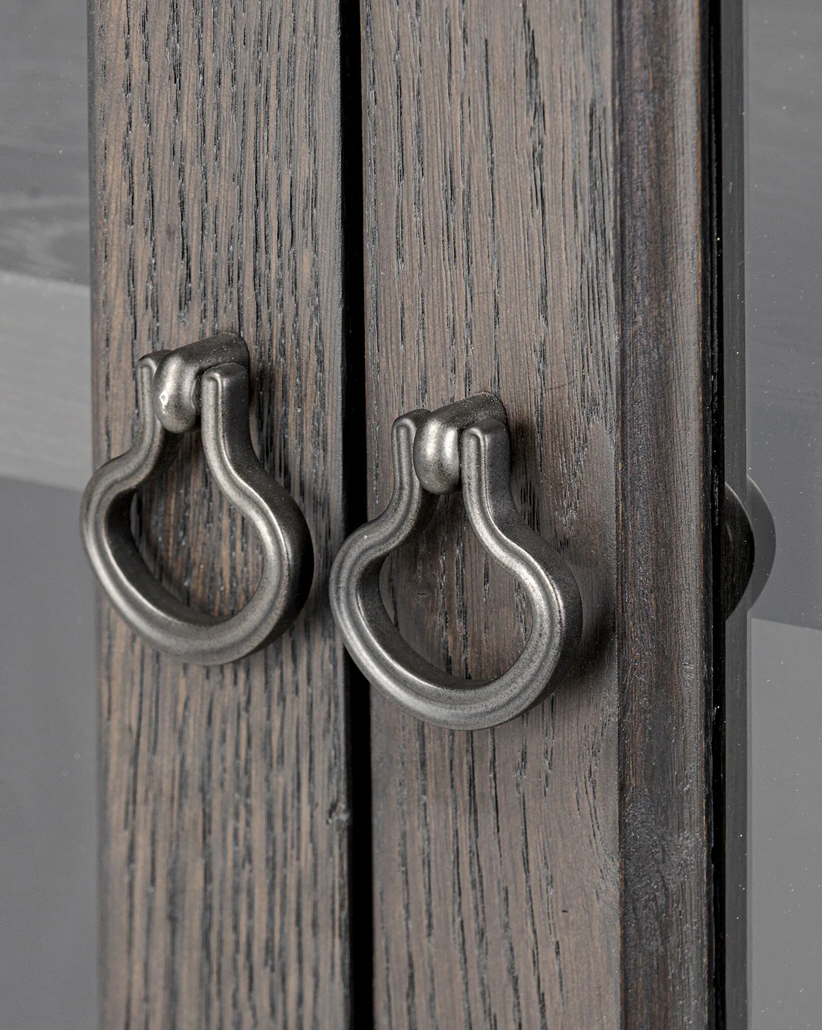 Industrial Worn Black Oak Cabinet with Glass Doors & Ring-Pull Hardware for Living Room