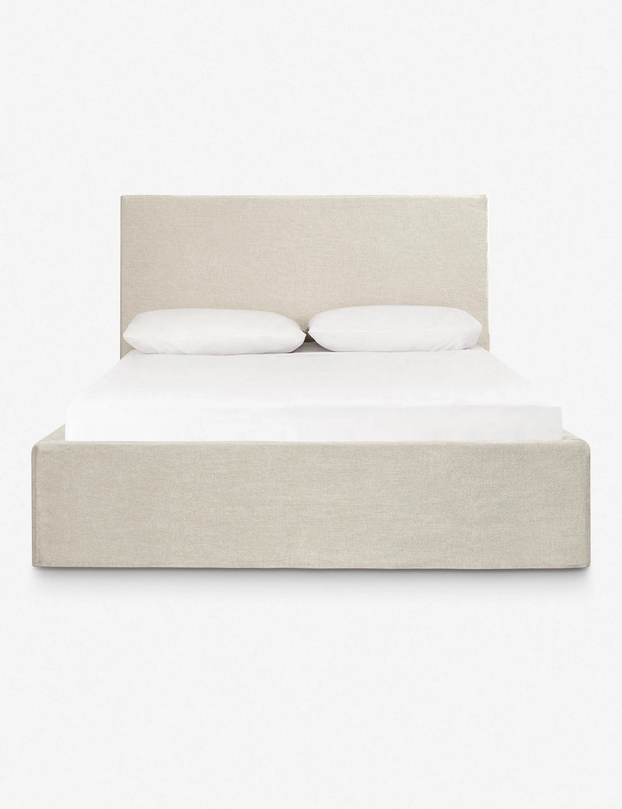 Bed Casual and easy to style, this platform bed features a linen slipcover-inspired drape for subtle texture throughout. The upholstered headboard