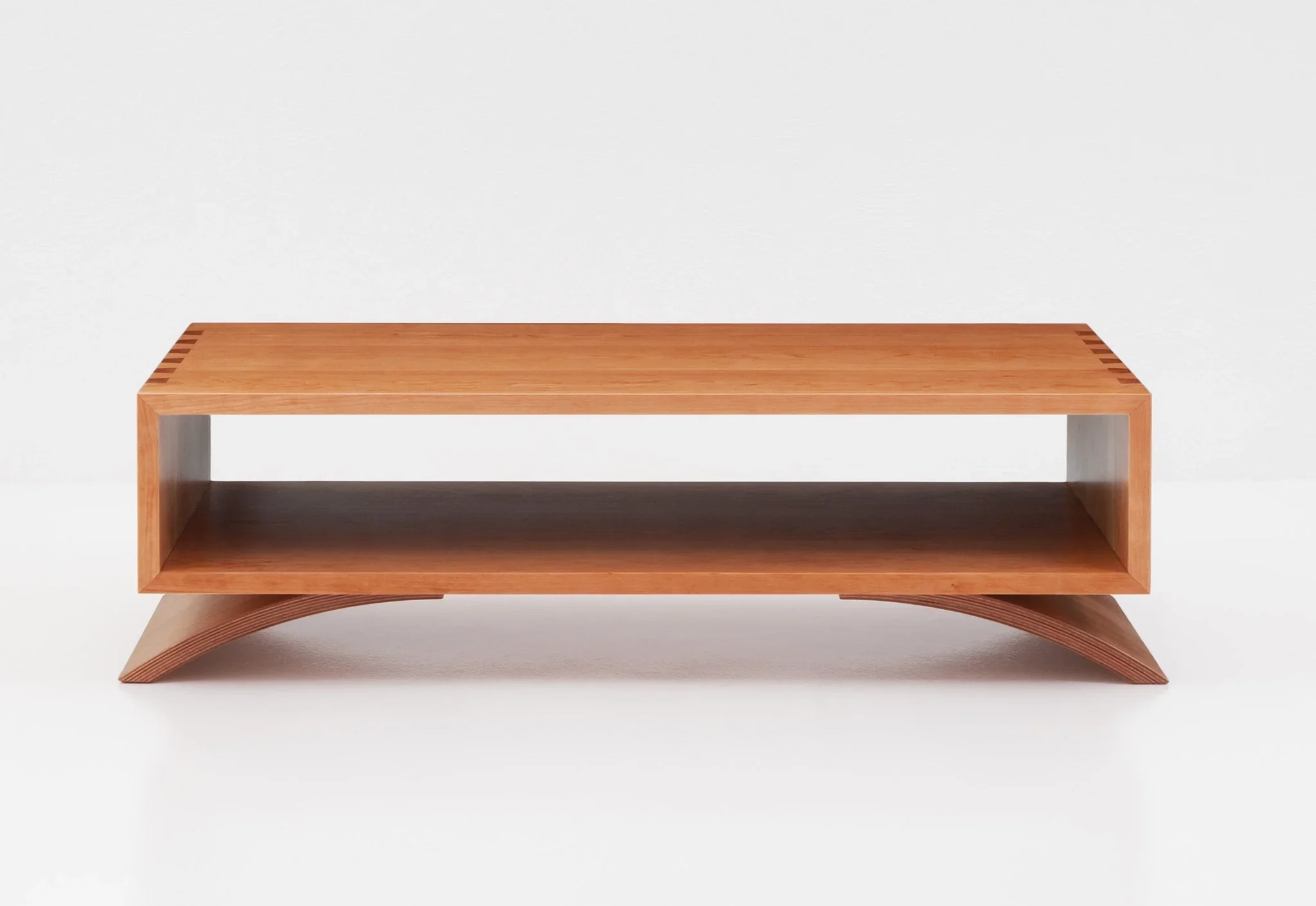 Coffee Table - The simple four-sided Coffee Table is a convenient perch for reading materials or any assortment of