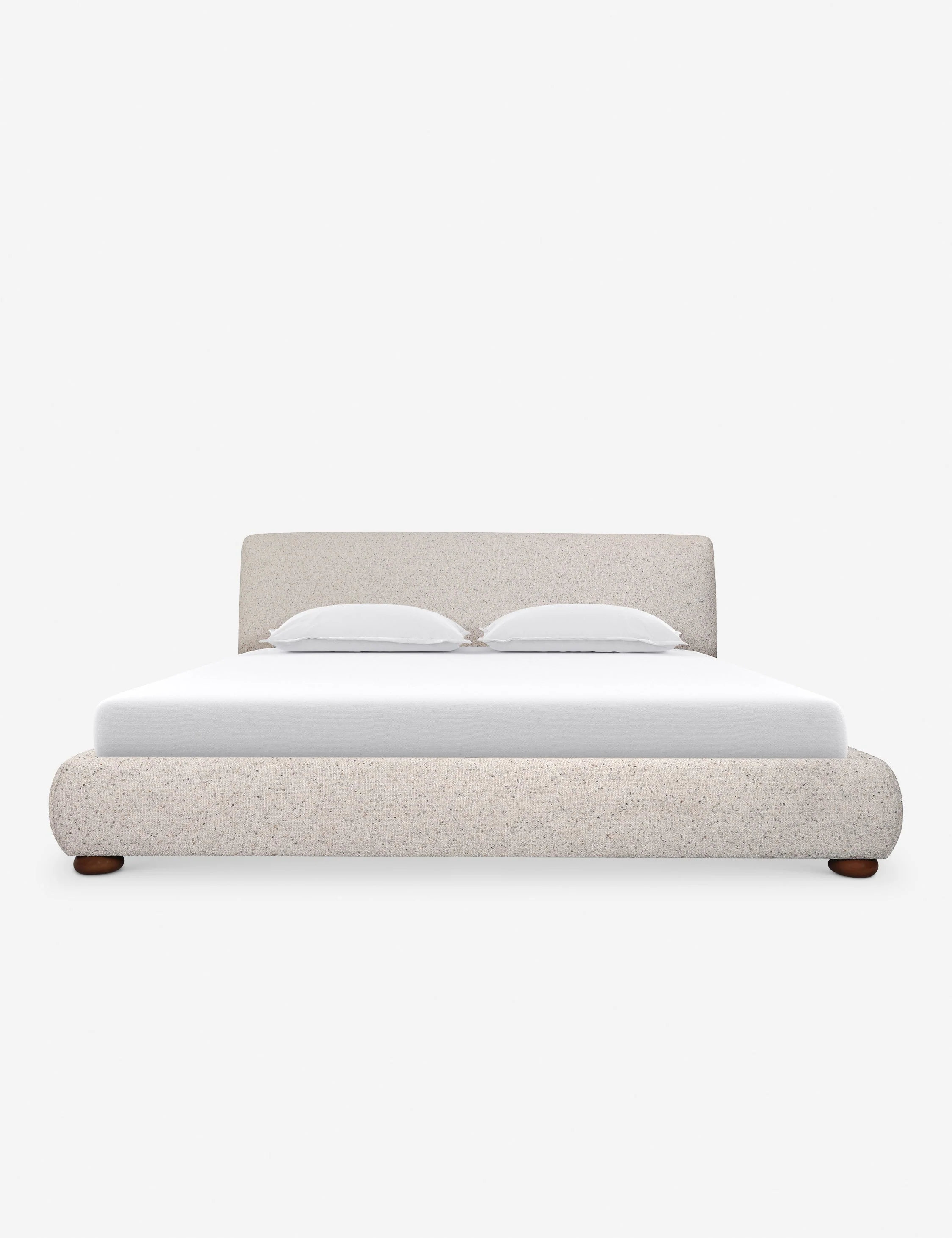 Bed - The bed offers soft impact with a softly rounded headboard and playful bun-style legs