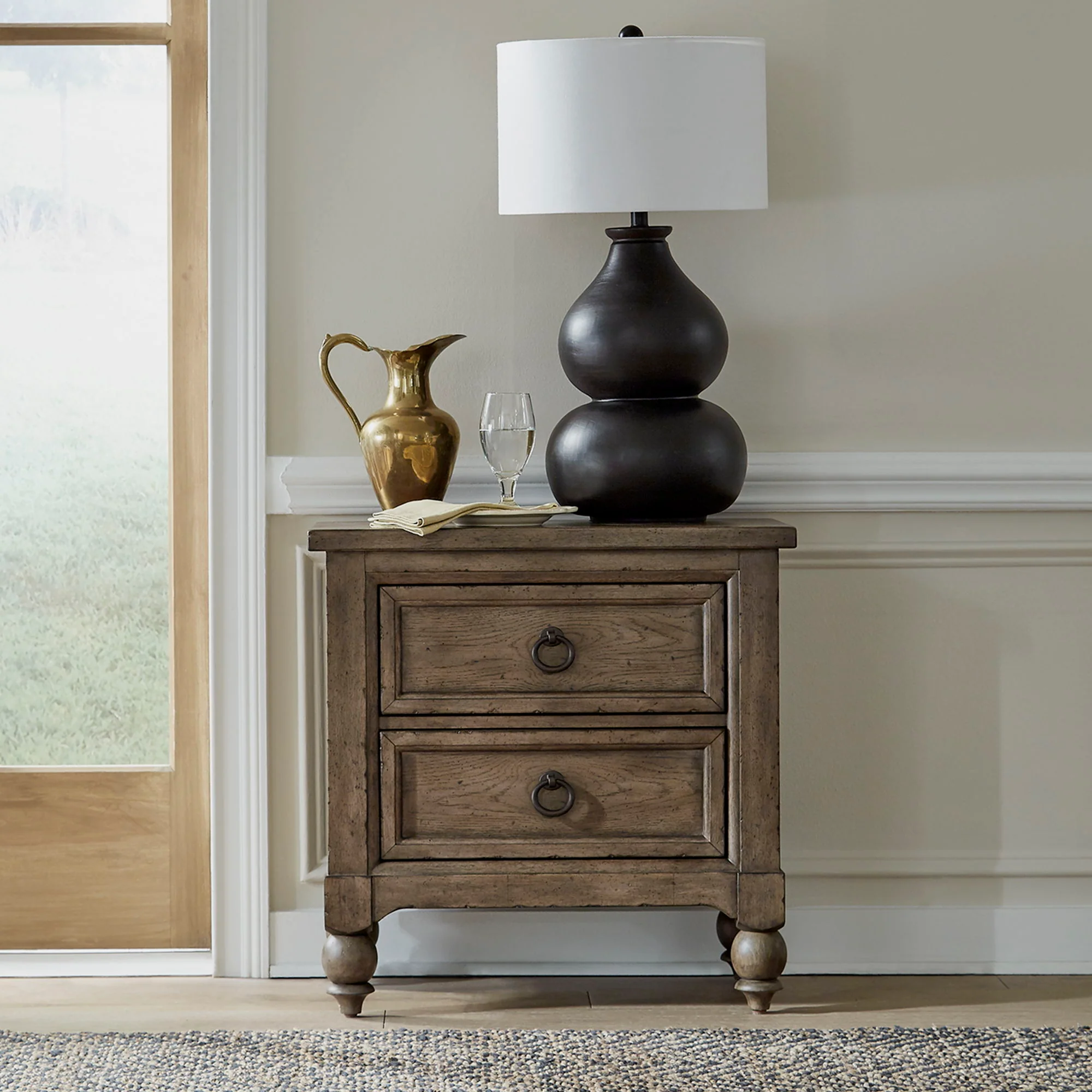 2 Drawer Night Stand With Charging Station — Also offers a charging station in back with two power outlets and two USB ports