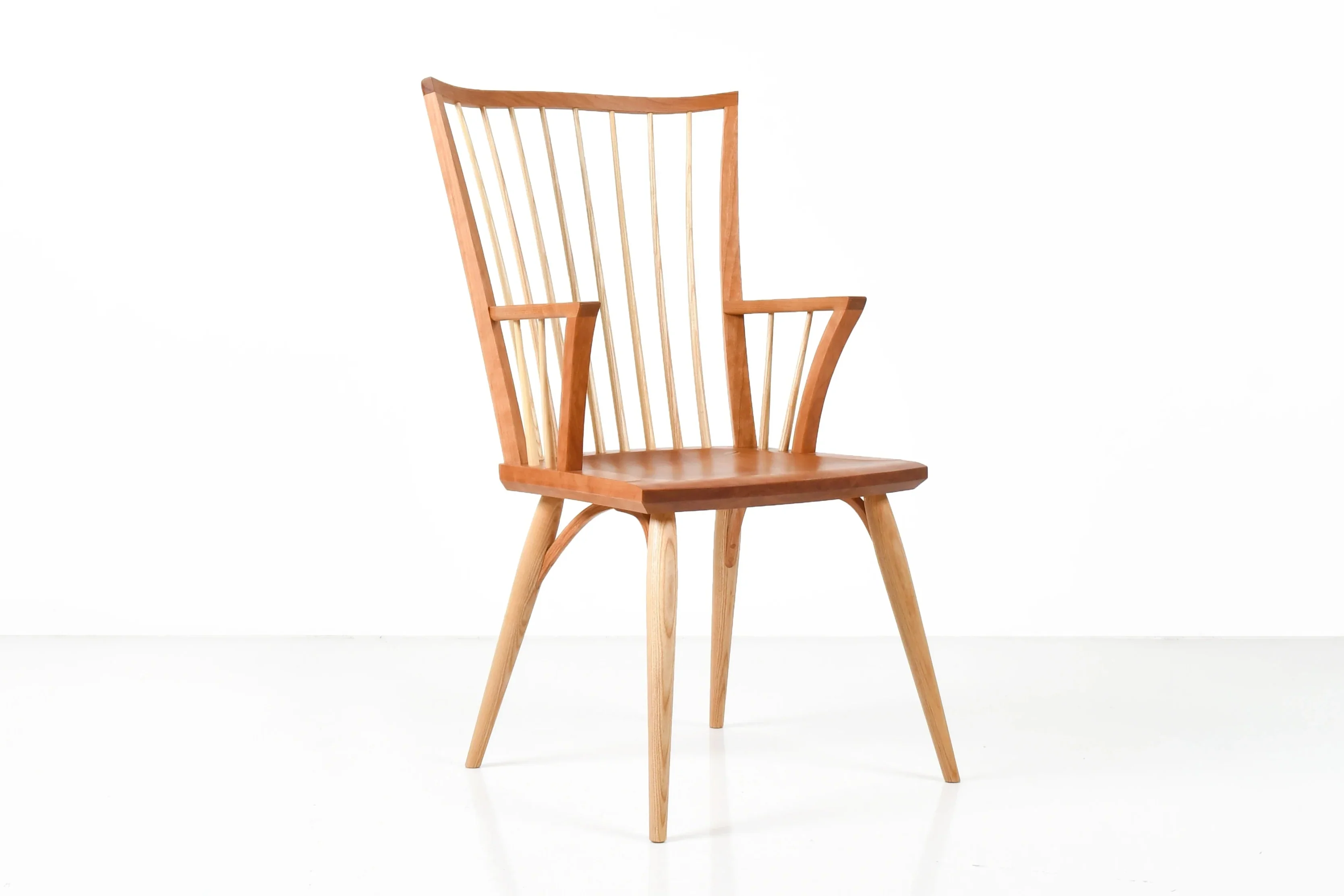 Arm Chair - A fresh derivation of the seminal our finds the perfect balance between light and substance