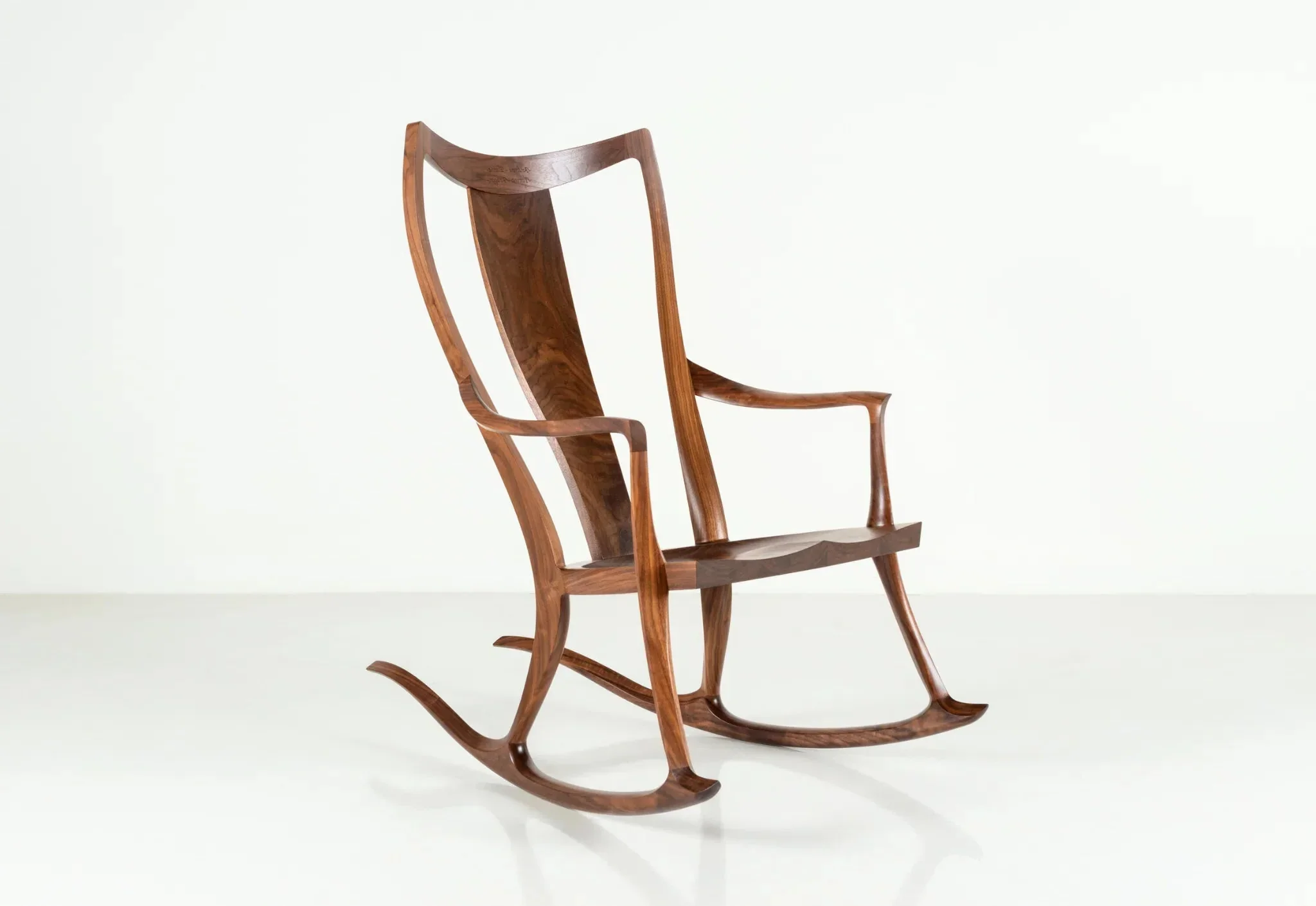 Rocker - Built of dense, workable North hardwoods, the Rocker gives the illusion that it was freed from a single piece