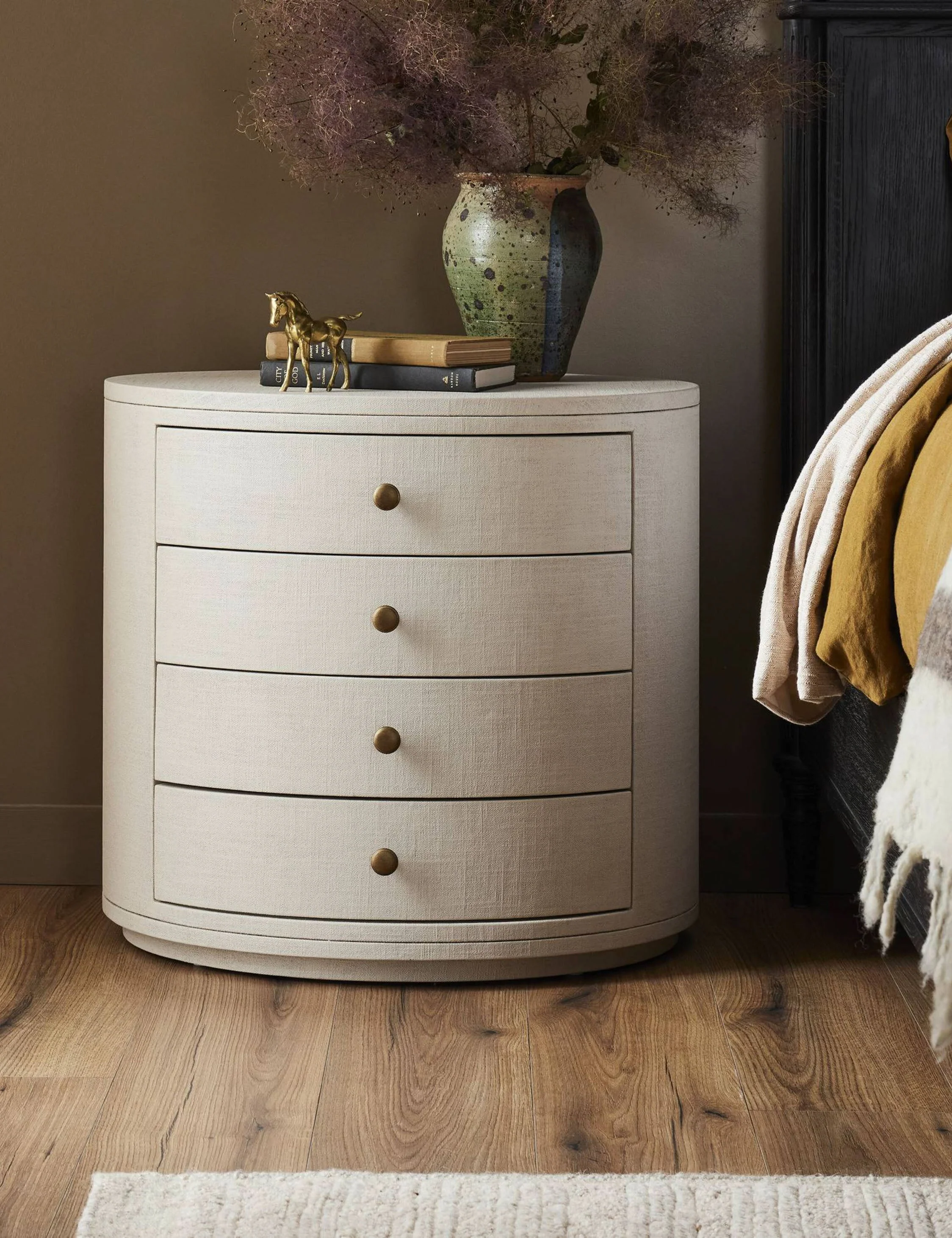 Nightstand - The nightstand brings clean curves and quiet texture to your bedside