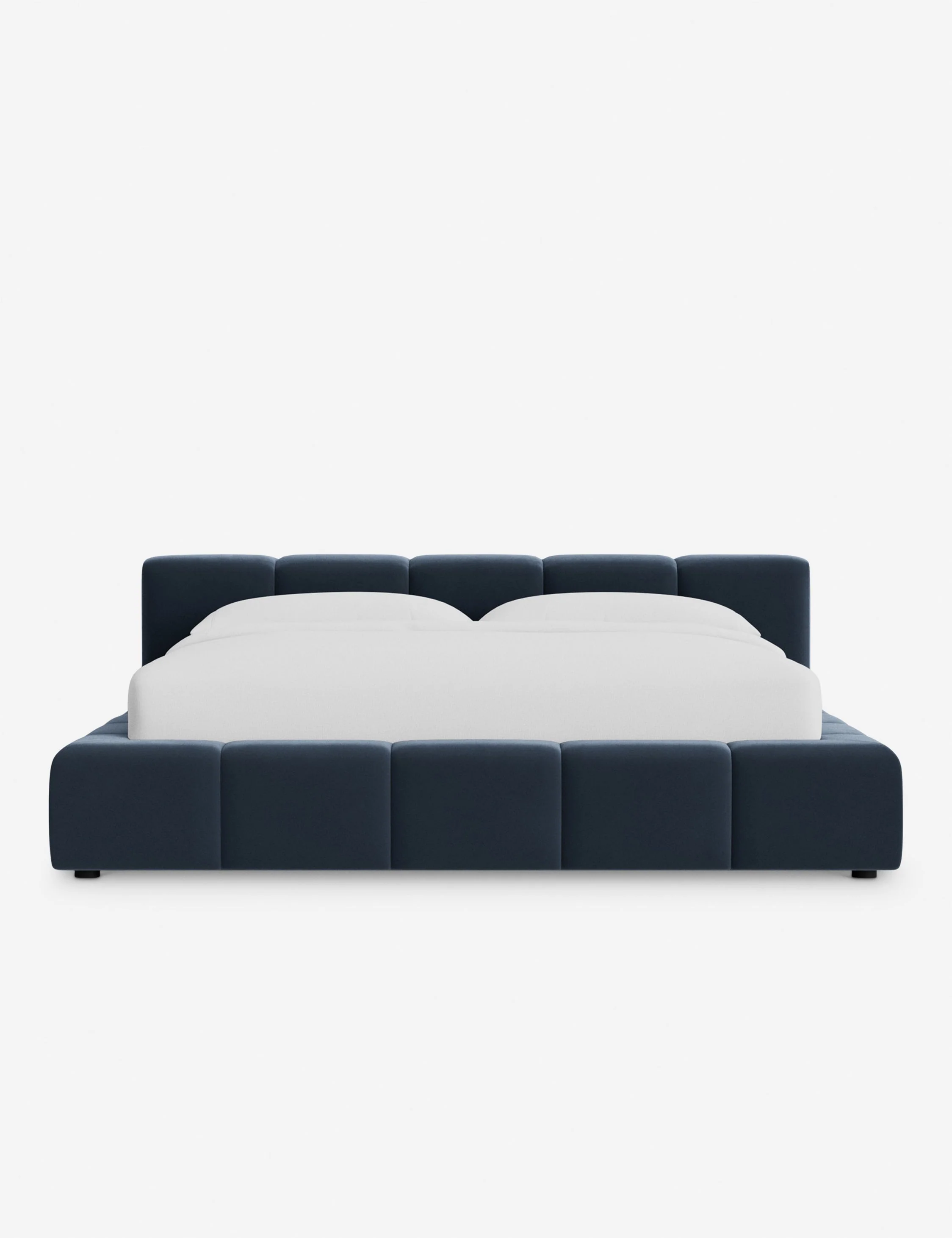 Platform Bed - A low squared headboard and matching footboard bring unity and balance to our bed