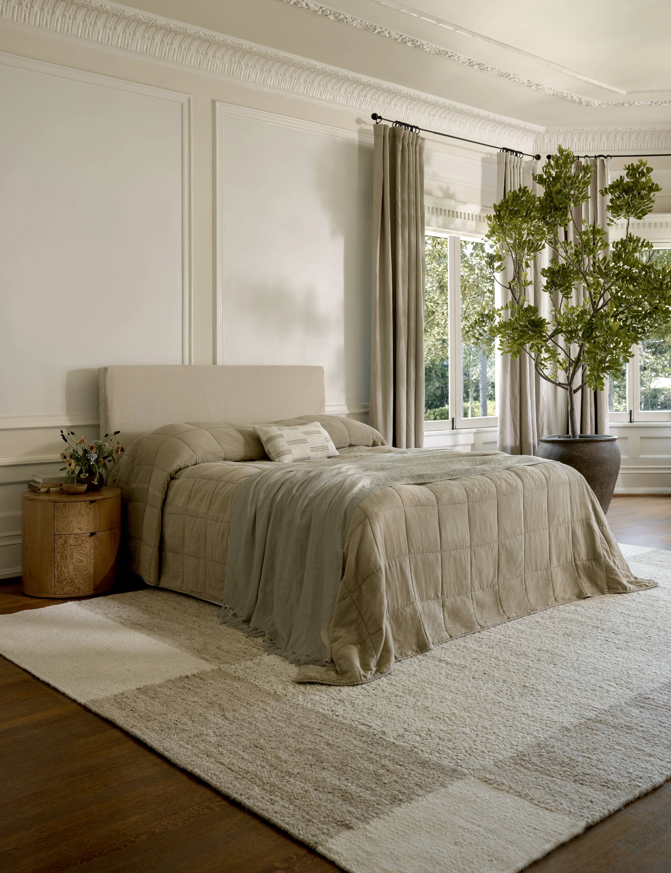 Bed Elegant in its simplicity, this bed frame features clean lines and a tall headboard to add an outsized presence to your room. The tailored
