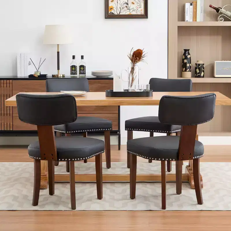 Two dining chairs in a set, modern leather upholstered, wood frame, 265 lb load capacity, easy to clean, curved backrest.