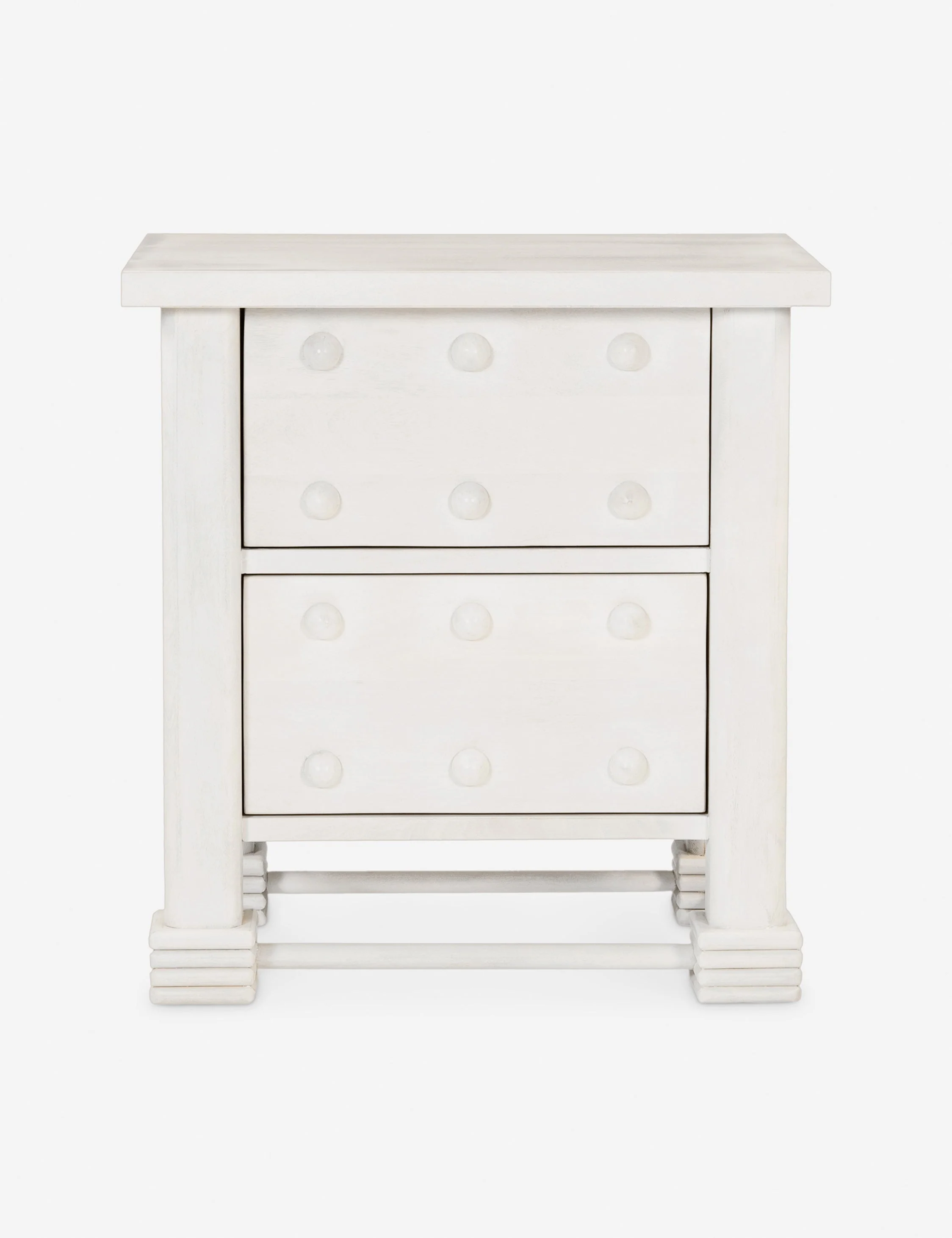 Nightstand - The nightstand cuts a chunky silhouette with French styling and knob motifs