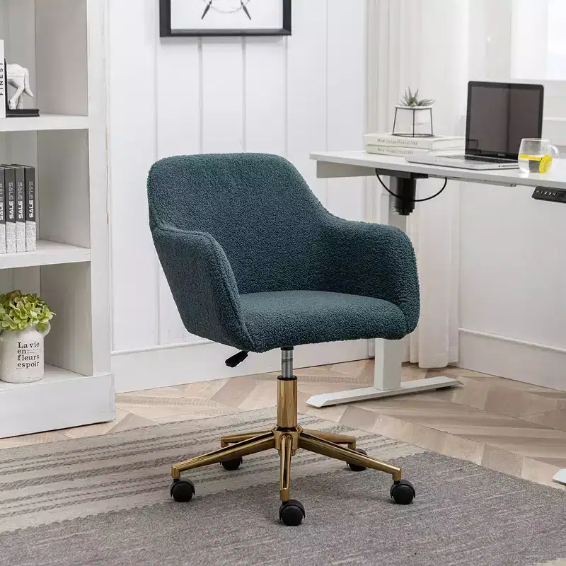 This swivel office chair is height-adjustable, has wheels, gold-plated legs, and a chrome-plated base.