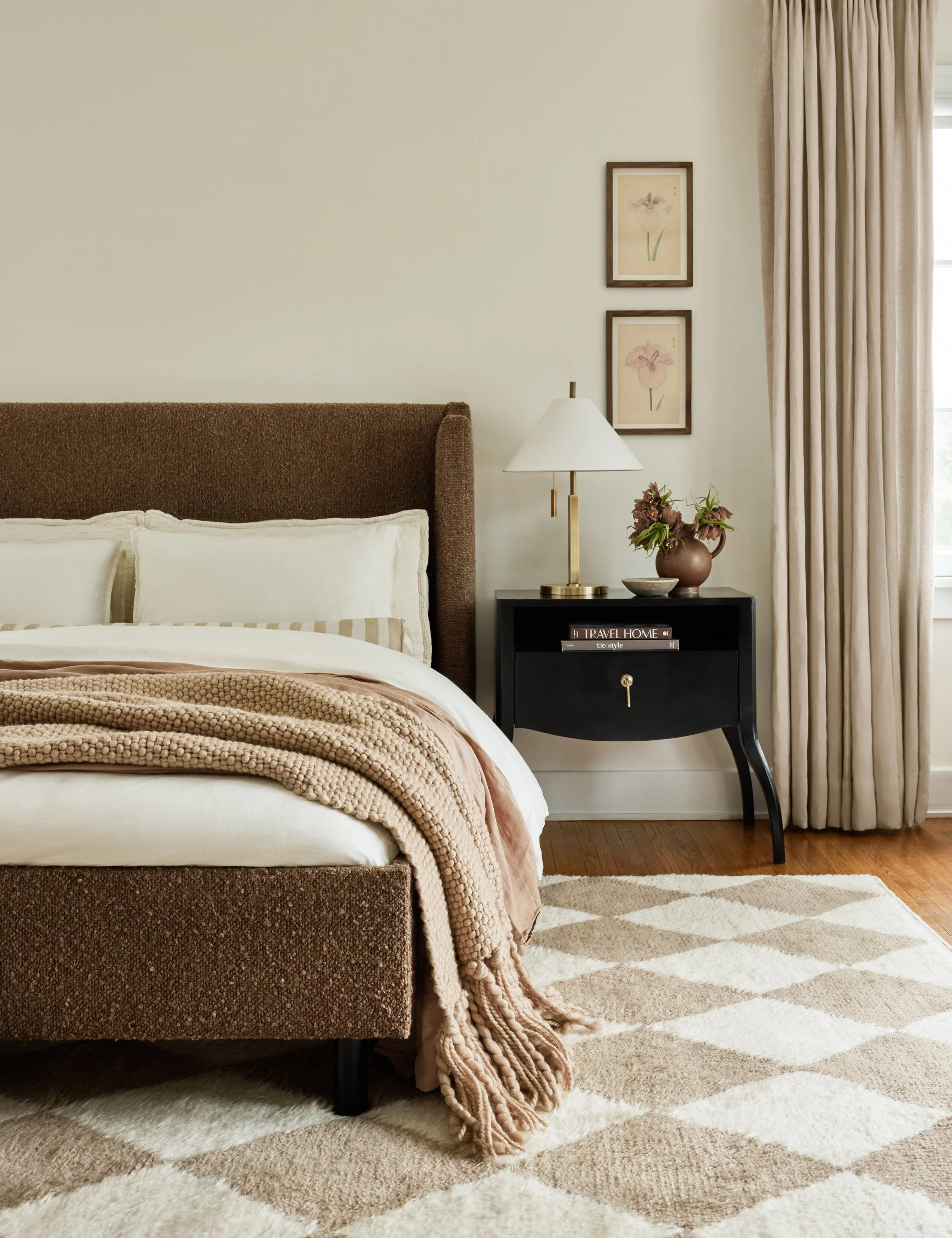 Nightstand Elevate your space with the dramatic curves and clean-edged silhouette of this nightstand from the collection. An open shelf