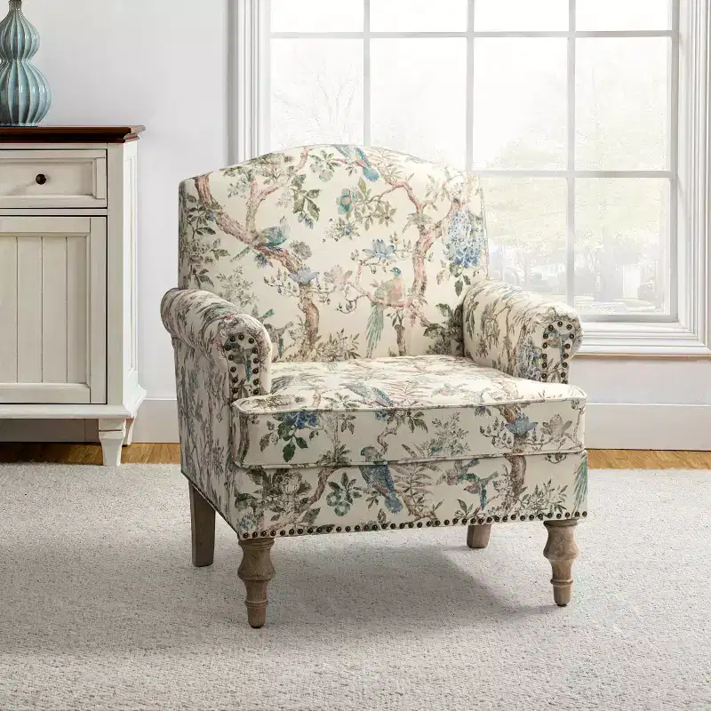 Wooden Upholstered Floral Pattern Armchair with Panel Arms and Camelback