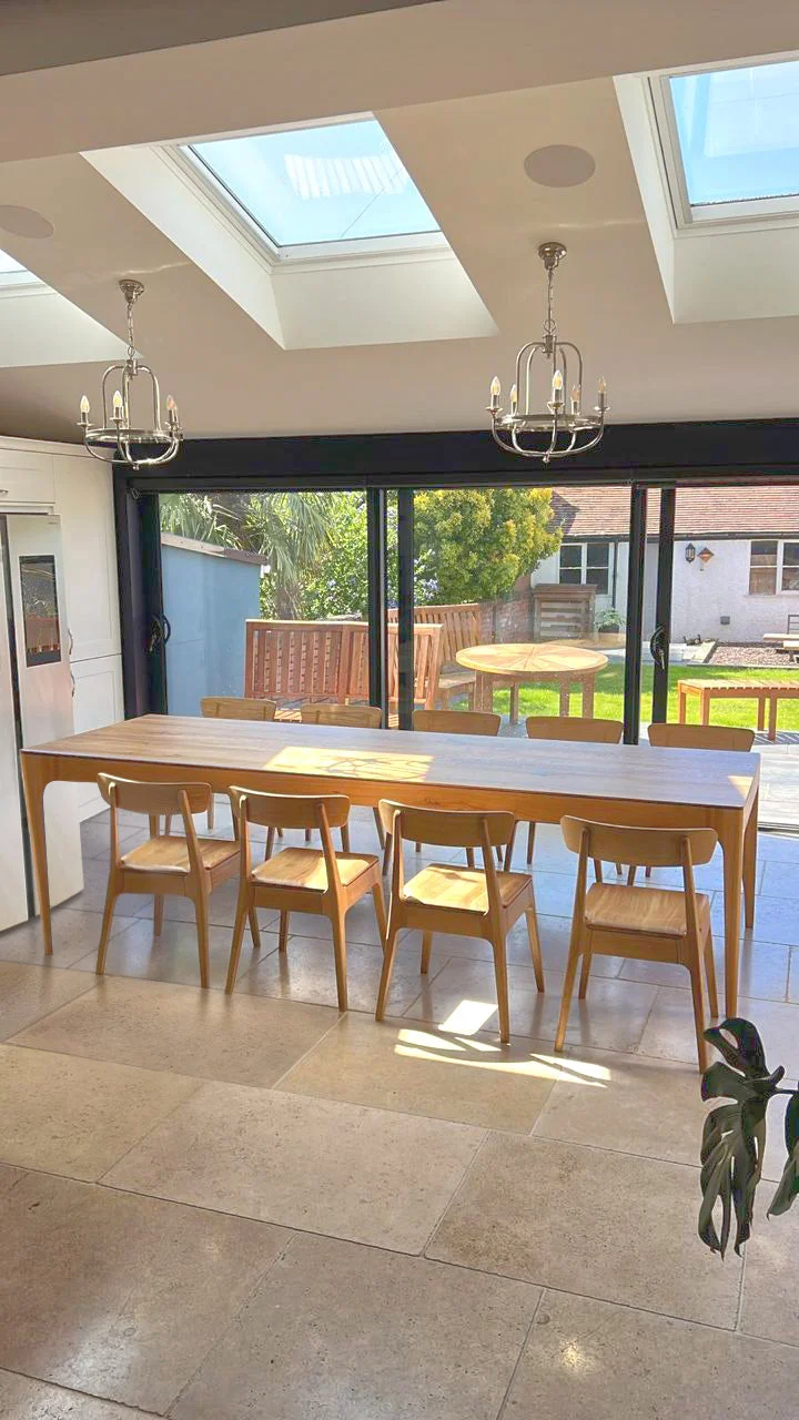 Oak Dining Table - oak dining room table boasts a sleek - contemporary design - characterised by its smooth lines and a tapering thickness
