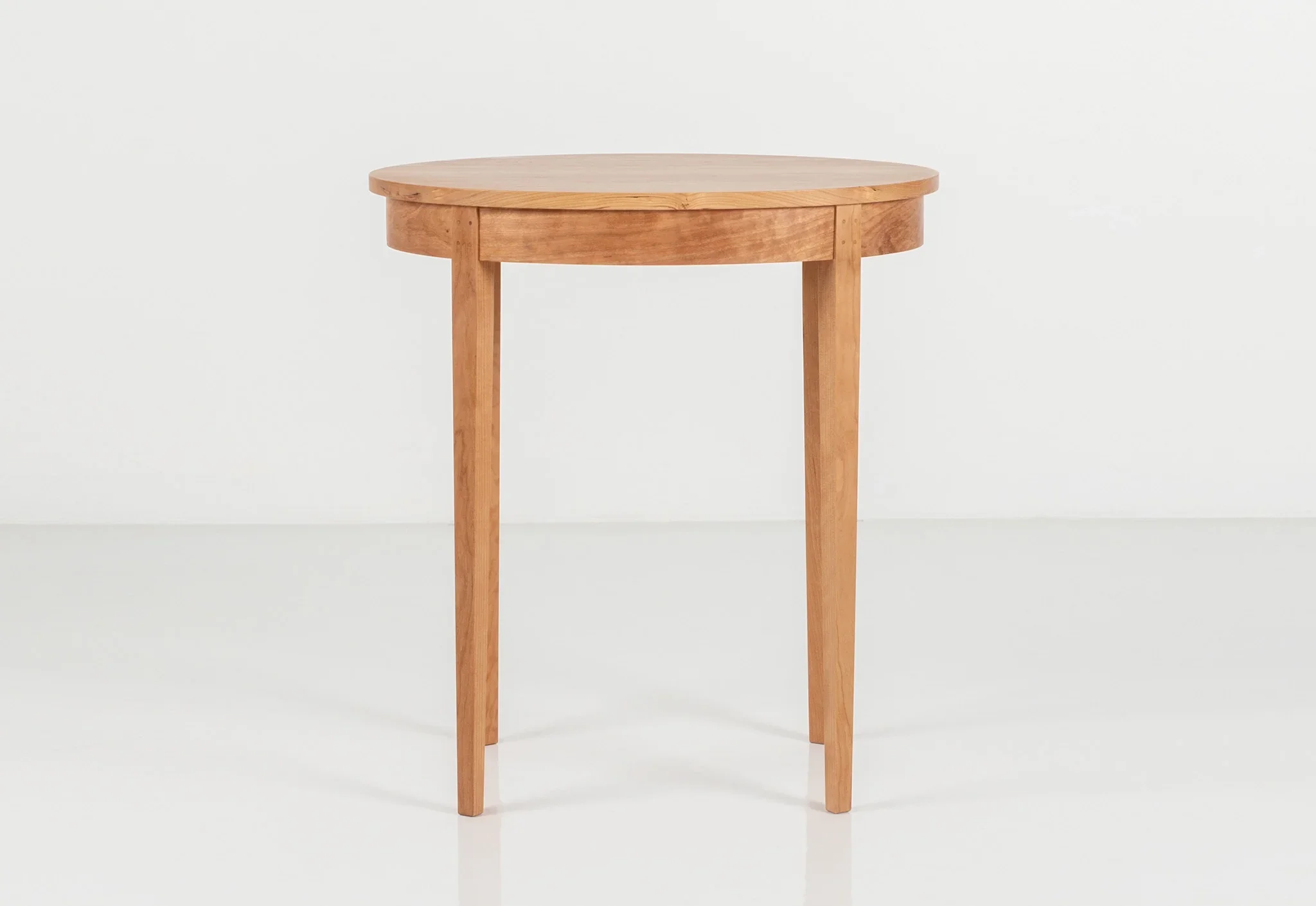 Table Minimus - Inspired by styles, these tables all share the same leg structure, with four slender columns that rise