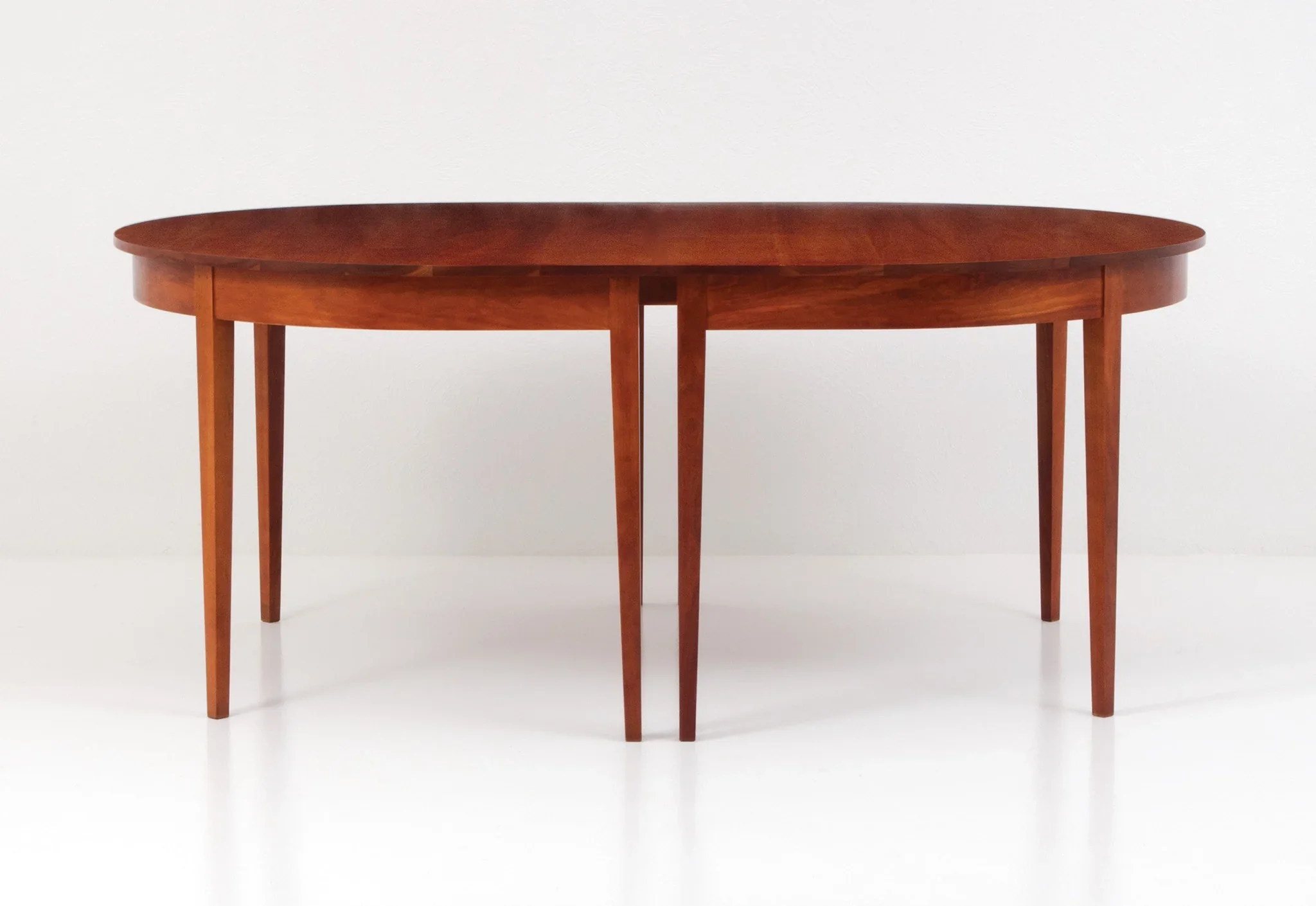 Oval Extension Table - Eight Leg - The graceful curves and rich grain patterns of the Oval Extension Table add a touch
