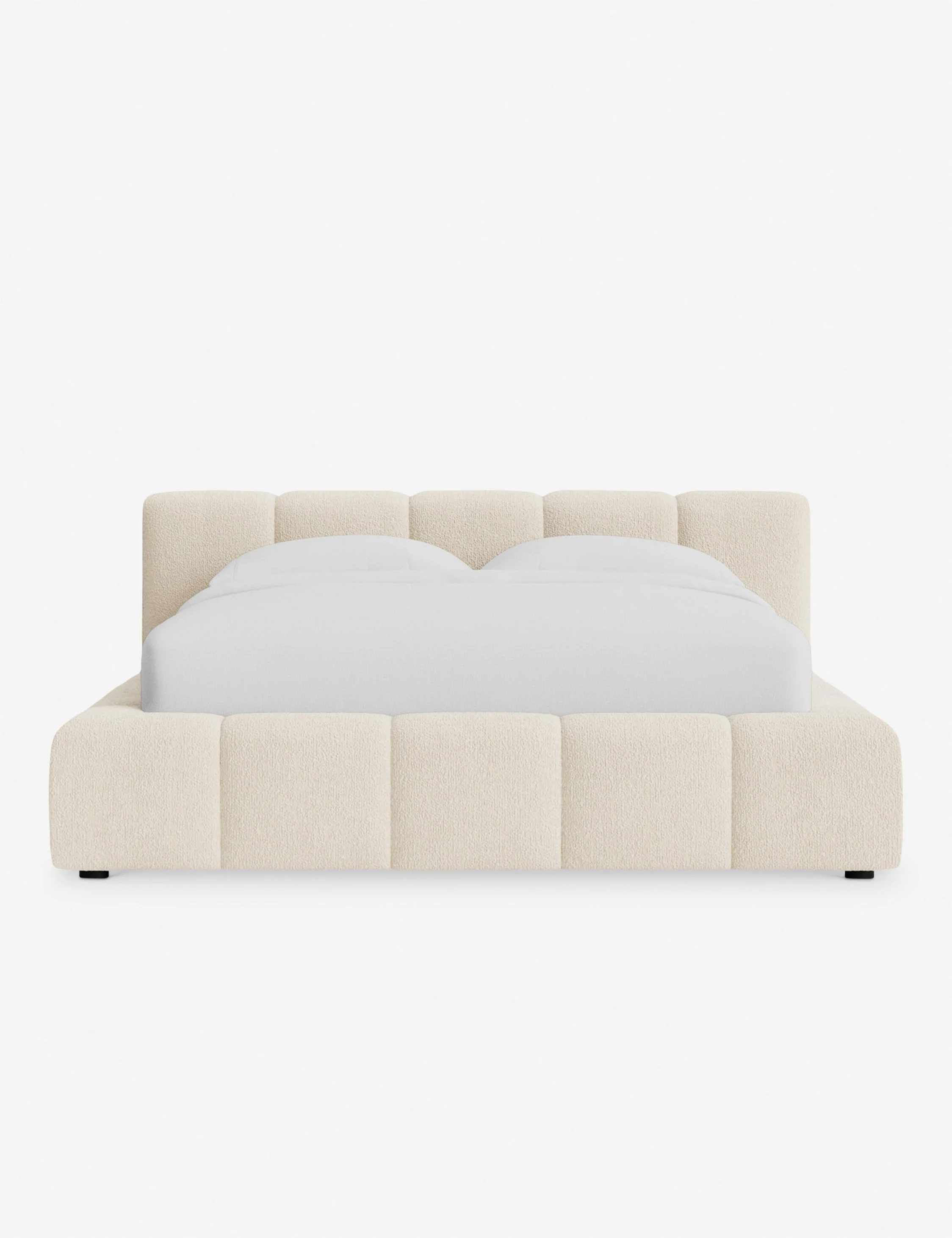 Platform Bed - A low squared headboard and matching footboard bring unity and balance to our bed