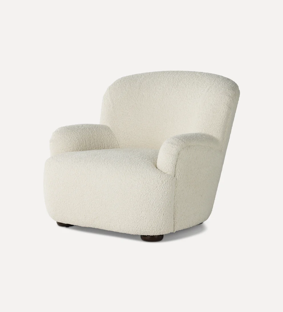 Chair Natural - Add some trendy style to your home with our Chair. - Crafted from sheepskin and designed with a high wing back, this curvy