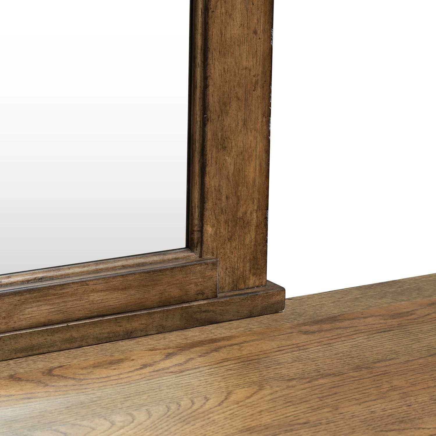 Dresser & Mirror - Amber Brown — warm amber finish highlighted by heavy overlay moldings for dimension and texture