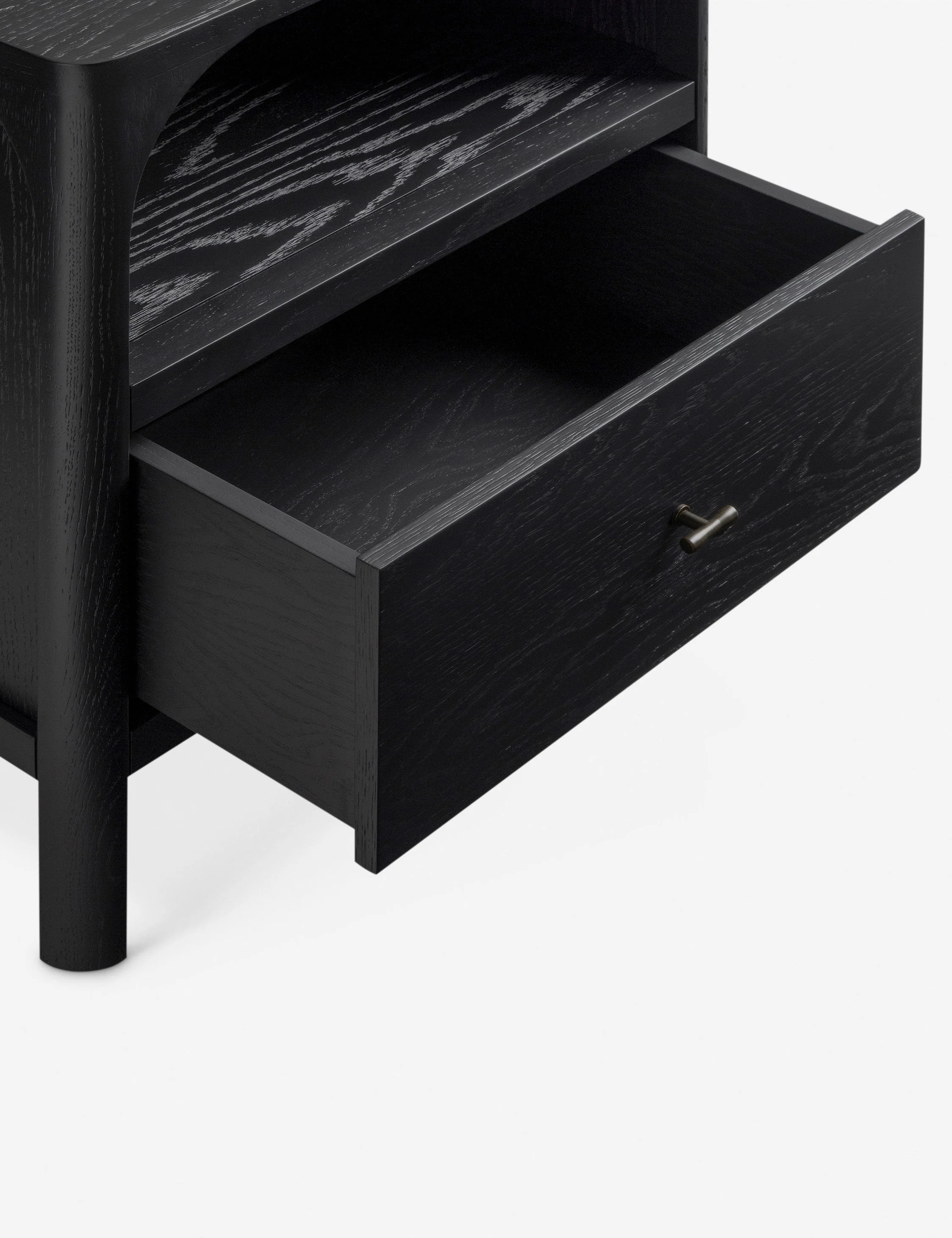 Nightstand - The nightstand keeps streamlined with an architectural silhouette softened by an arched open shelf